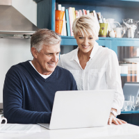 A couple looking at a laptop