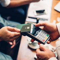 A person paying with a credit card